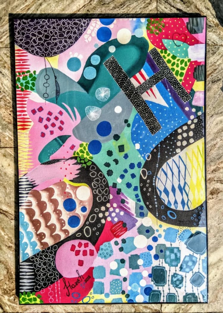 Fabric swatches and paint samples on the studio table