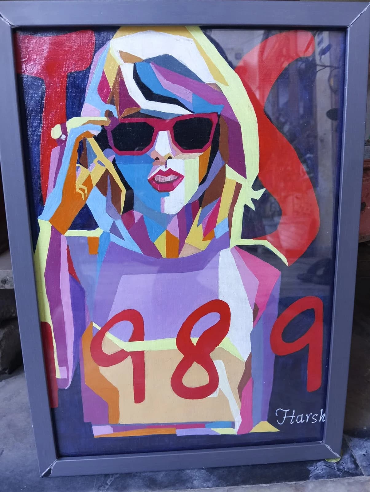 Pop-art portrait of a woman with sunglasses and cubist colour fragments